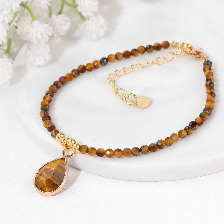 Pulsera con colgante de gota de agua y cuentas de piedra natural de Olivenorma