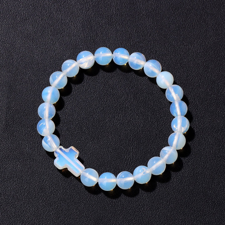 Pulsera con colgante de cruz de cuentas de cristal natural de Olivenorma