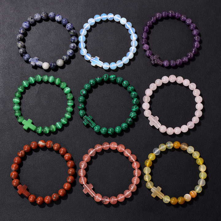 Pulsera con colgante de cruz de cuentas de cristal natural de Olivenorma