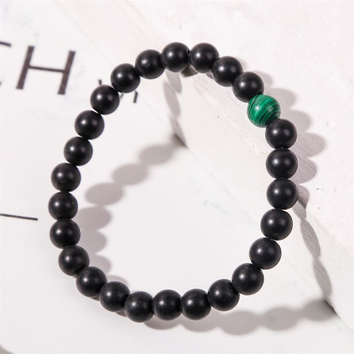 Pulsera Olivenorma de cuentas de ónix negro y malaquita de 8 mm