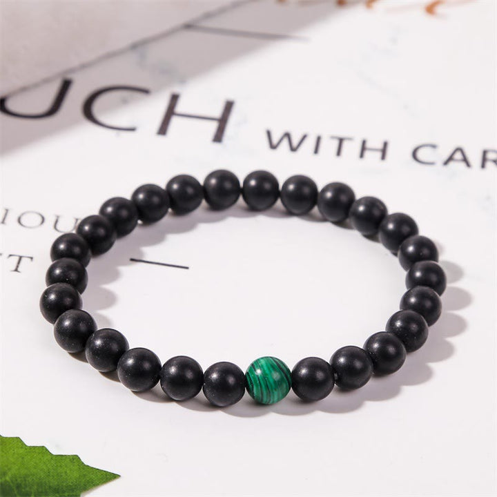 Pulsera Olivenorma de cuentas de ónix negro y malaquita de 8 mm