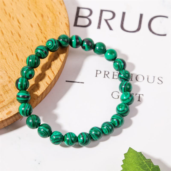 Pulsera Olivenorma de cuentas de ónix negro y malaquita de 8 mm