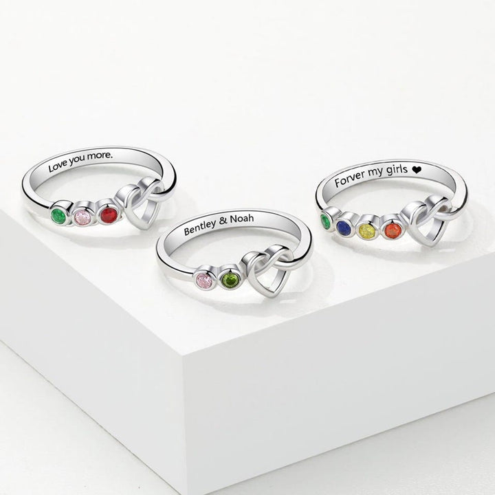 Anillo con piedra natal grabada en forma de corazón de Olivenorma Corbatas Personalizadas