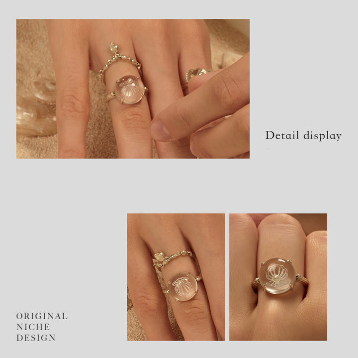 Anillo con diseño de concha de perla de cristal transparente de Olivenorma