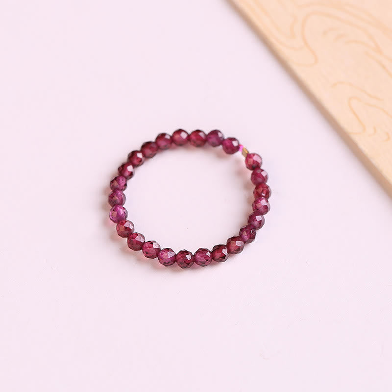 Anillo de cuentas de granate extrafino de 2 mm de Olivenorma