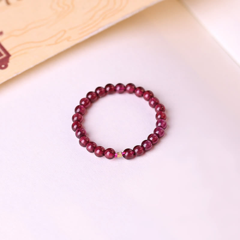 Anillo de cuentas de granate extrafino de 2 mm de Olivenorma