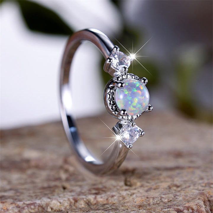 Anillo de ópalo redondo de cuatro puntas de Olivenorma