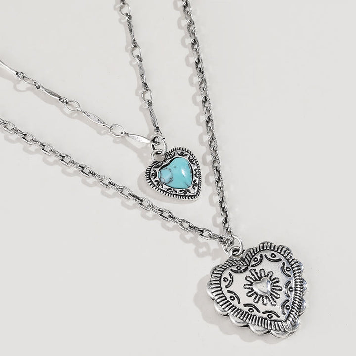 Conjunto de joyas con pendientes y colgante de cruz de amor turquesa de Olivenorma