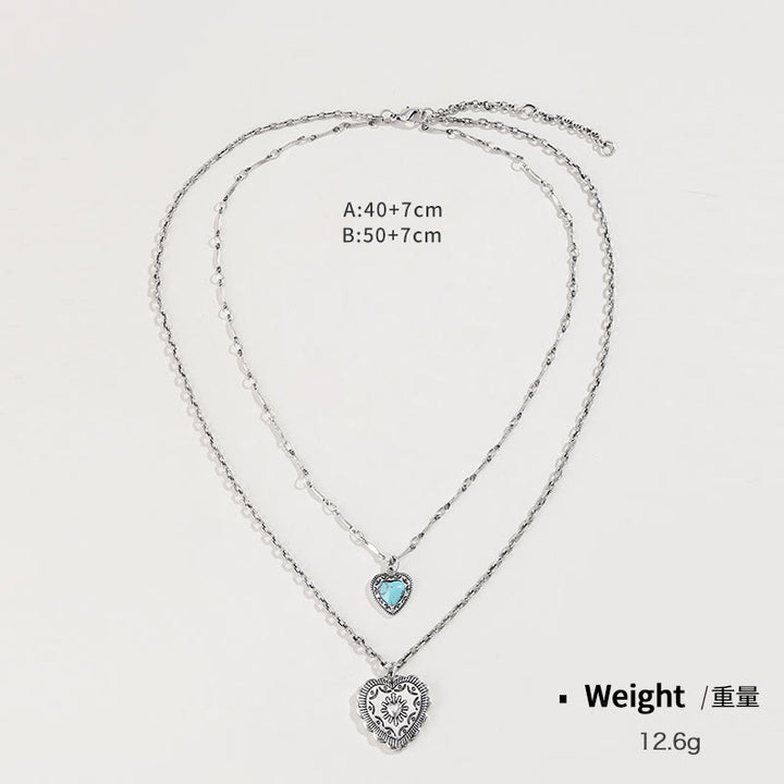 Conjunto de joyas con pendientes y colgante de cruz de amor turquesa de Olivenorma