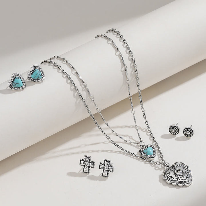 Conjunto de joyas con pendientes y colgante de cruz de amor turquesa de Olivenorma