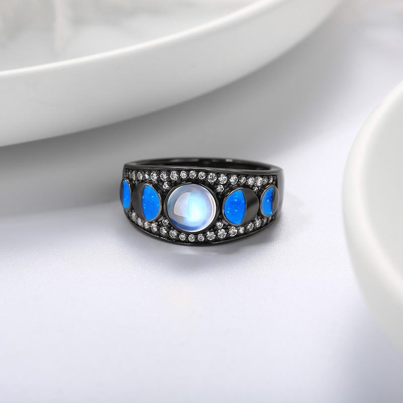 Anillo de plata con borde ancho y ópalo de piedra lunar de Olivenorma