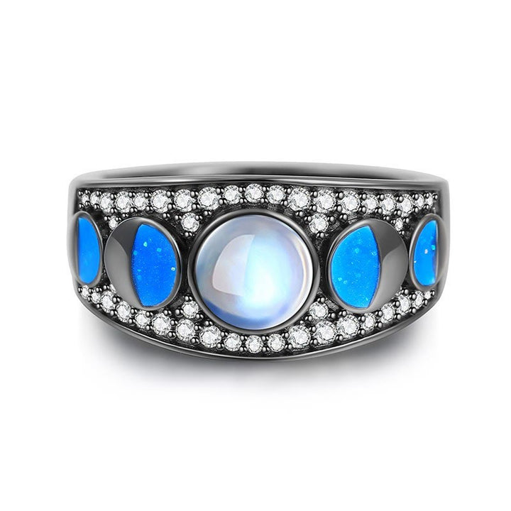 Anillo de plata con borde ancho y ópalo de piedra lunar de Olivenorma