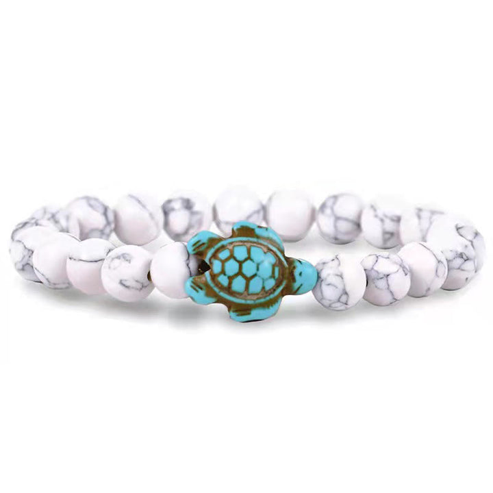 Olivenorma "Sense of Flow": pulsera sencilla con forma de tortuga y turquesa de piedra natural 