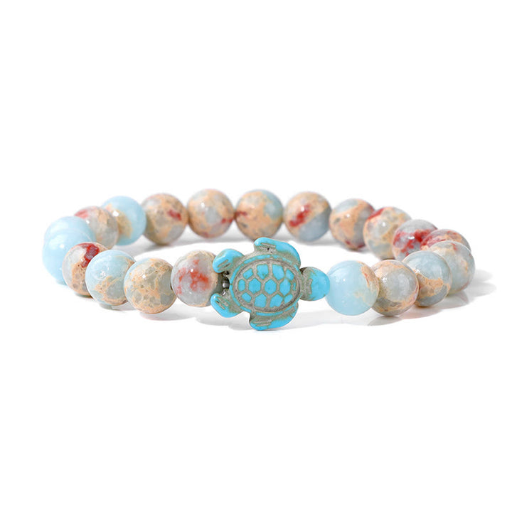 Olivenorma "Sense of Flow": pulsera sencilla con forma de tortuga y turquesa de piedra natural 