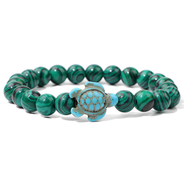 Olivenorma "Sense of Flow": pulsera sencilla con forma de tortuga y turquesa de piedra natural 