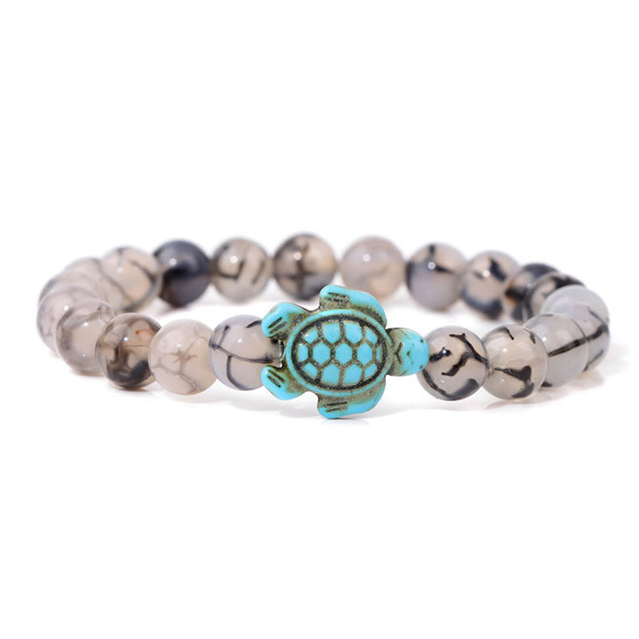 Olivenorma "Sense of Flow": pulsera sencilla con forma de tortuga y turquesa de piedra natural 