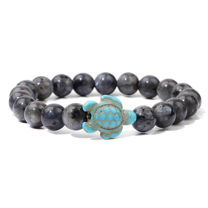 Olivenorma "Sense of Flow": pulsera sencilla con forma de tortuga y turquesa de piedra natural 