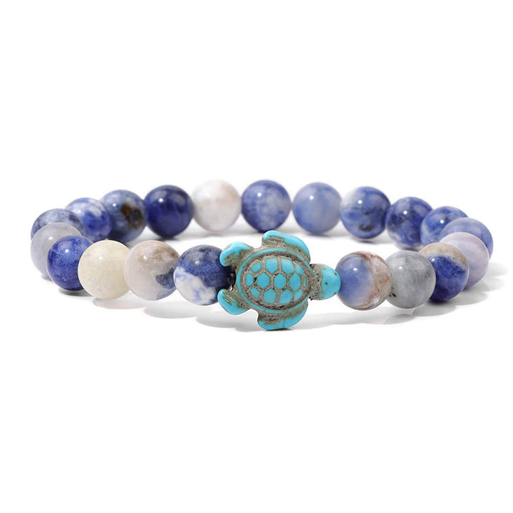 Olivenorma "Sense of Flow": pulsera sencilla con forma de tortuga y turquesa de piedra natural 