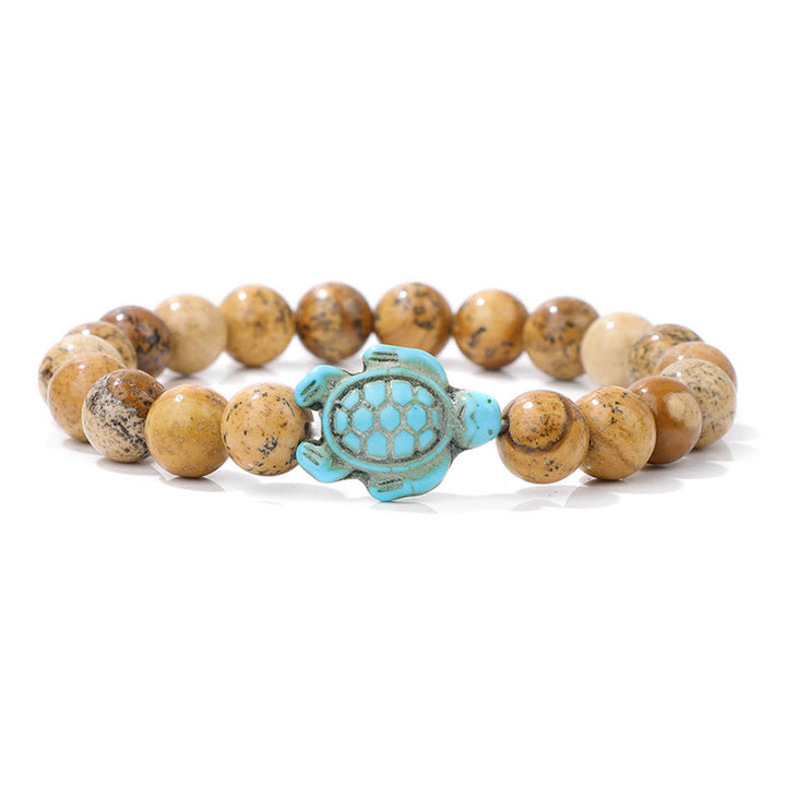 Olivenorma "Sense of Flow": pulsera sencilla con forma de tortuga y turquesa de piedra natural 