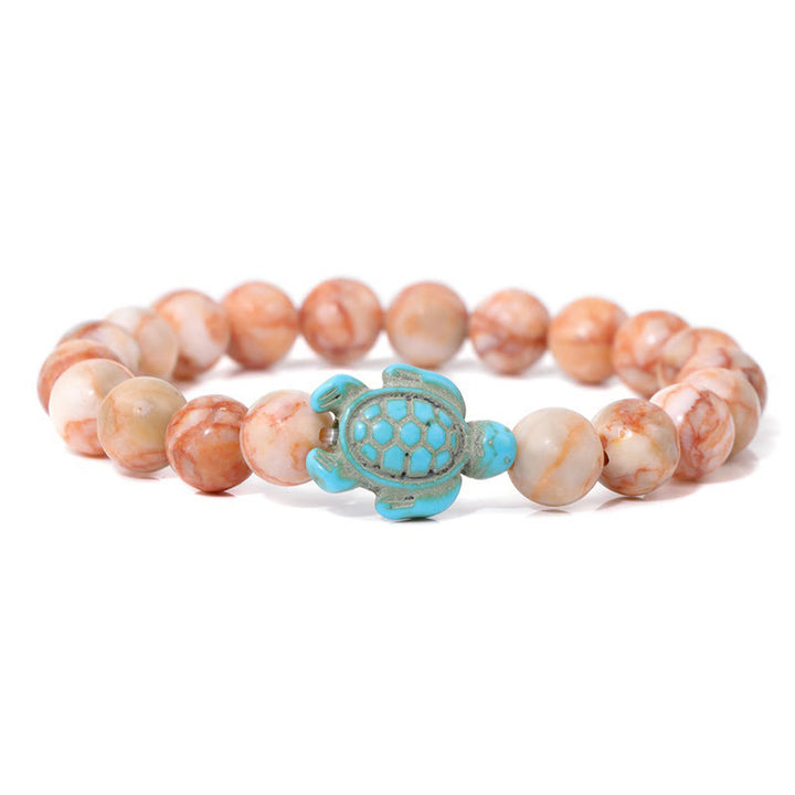 Olivenorma "Sense of Flow": pulsera sencilla con forma de tortuga y turquesa de piedra natural 