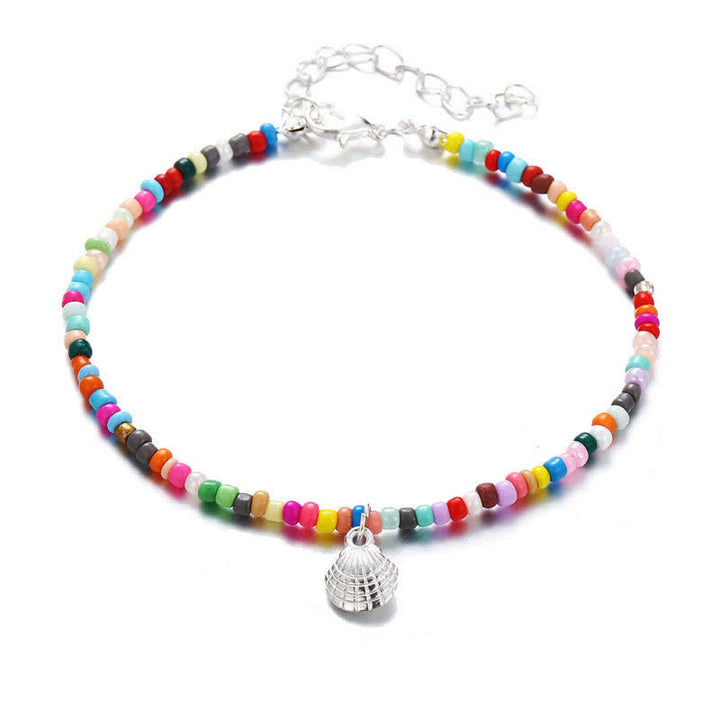 Tobillero de playa con colgante de concha y cuentas de colores de Olivenorma
