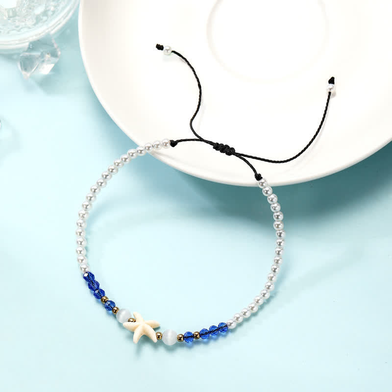 Tobillera tejida a mano con colgante de estrella de mar y perla de agua dulce de Olivenorma