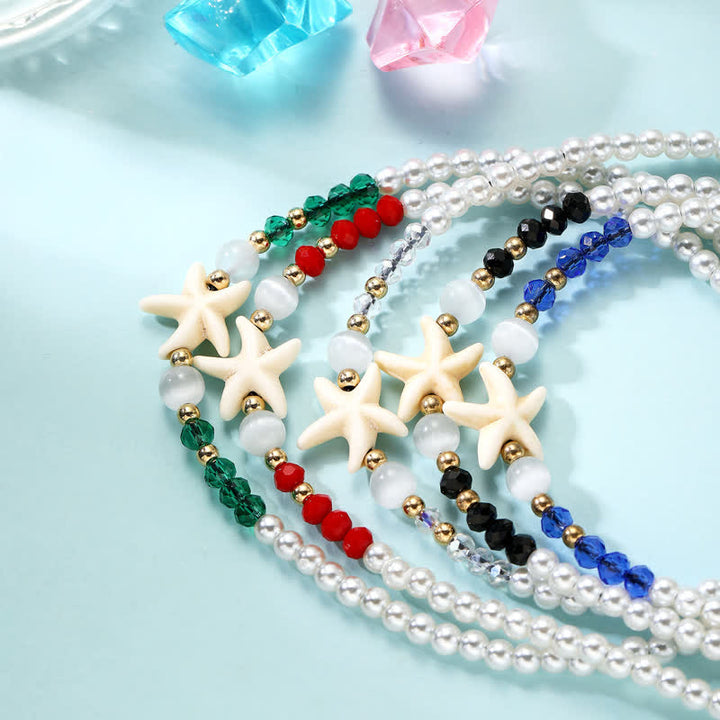Tobillera tejida a mano con colgante de estrella de mar y perla de agua dulce de Olivenorma