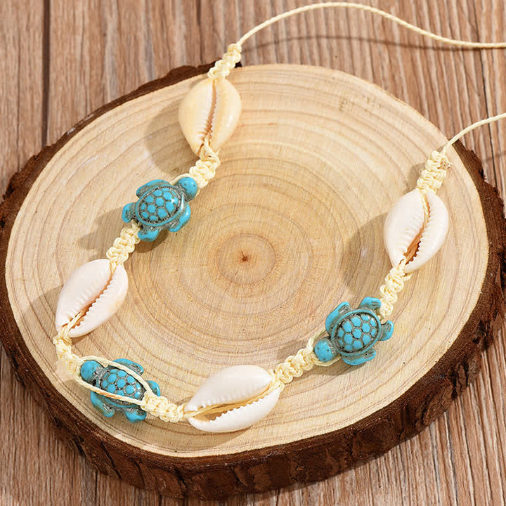 Tobillera trenzada con concha de tortuga y estrella de mar turquesa de Olivenorma