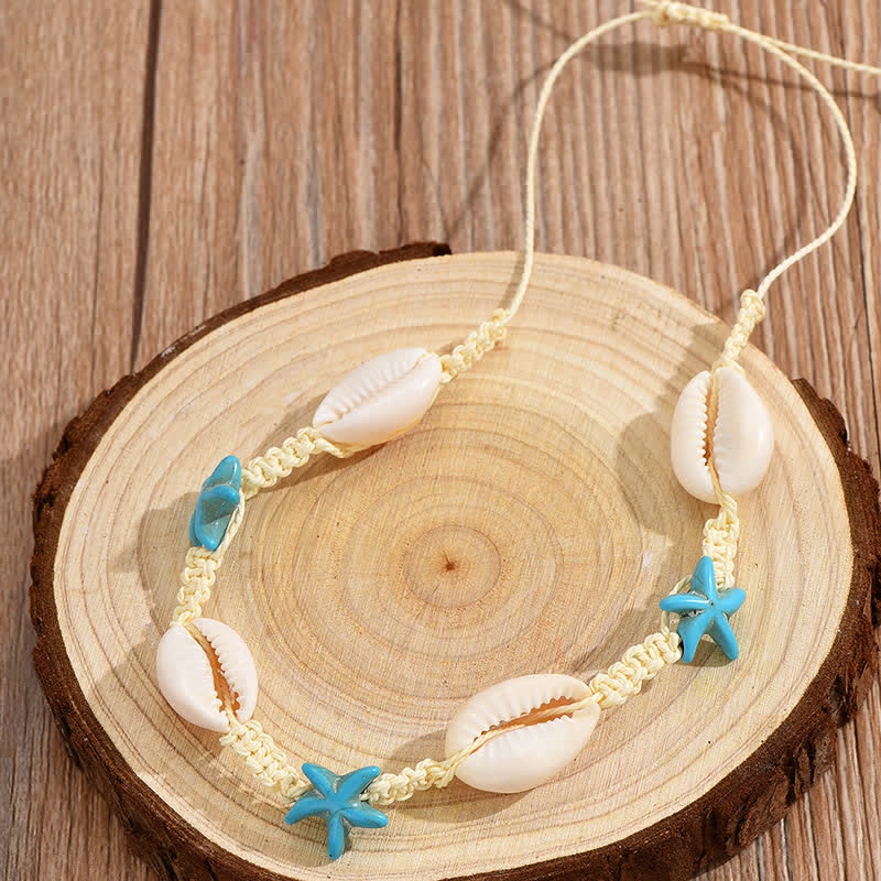 Tobillera trenzada con concha de tortuga y estrella de mar turquesa de Olivenorma