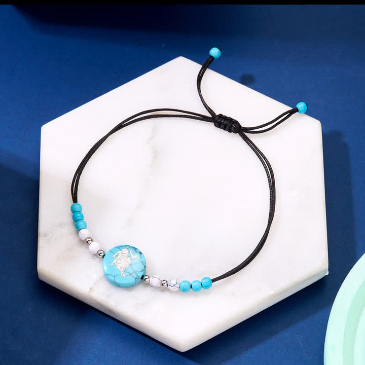 Pulsera trenzada turquesa con patrón del zodiaco de las 12 constelaciones de Olivenorma 