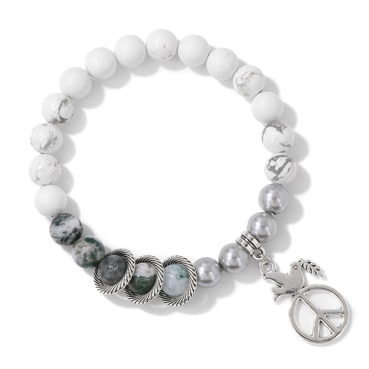 Pulsera de cristal con forma de paloma de la paz "Embrace Peace" de Olivenorma 