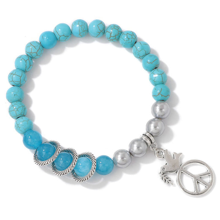 Pulsera de cristal con forma de paloma de la paz "Embrace Peace" de Olivenorma 