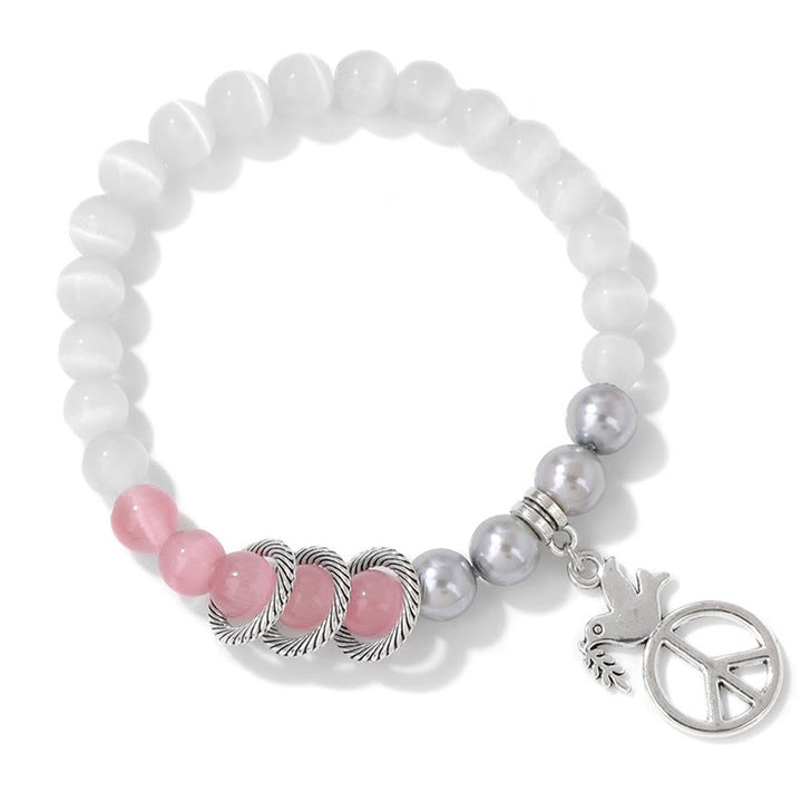 Pulsera de cristal con forma de paloma de la paz "Embrace Peace" de Olivenorma 