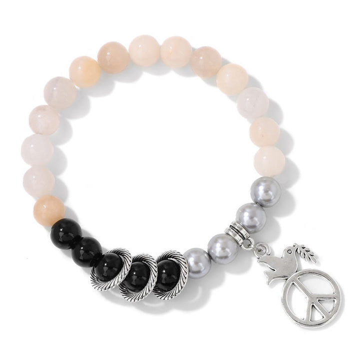 Pulsera de cristal con forma de paloma de la paz "Embrace Peace" de Olivenorma 