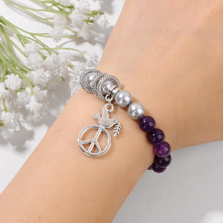 Pulsera de cristal con forma de paloma de la paz "Embrace Peace" de Olivenorma 