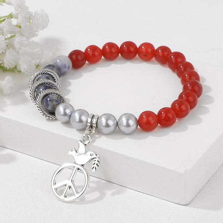 Pulsera de cristal con forma de paloma de la paz "Embrace Peace" de Olivenorma 
