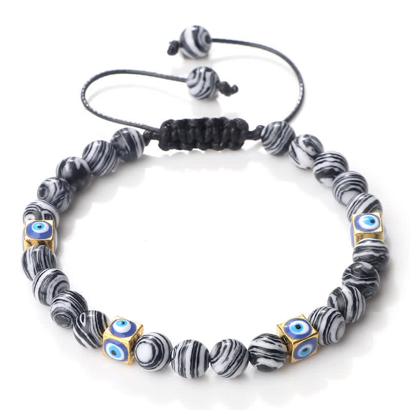 Pulsera trenzada con cuentas de cristal natural de Olivenorma para el mal de ojo 