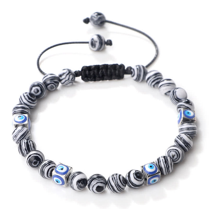 Pulsera trenzada con cuentas de cristal natural de Olivenorma para el mal de ojo 