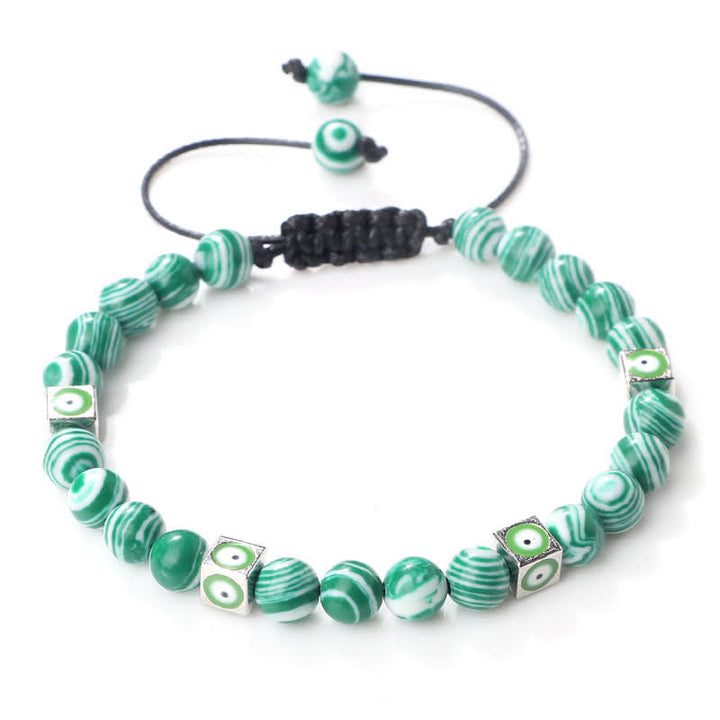 Pulsera trenzada con cuentas de cristal natural de Olivenorma para el mal de ojo 