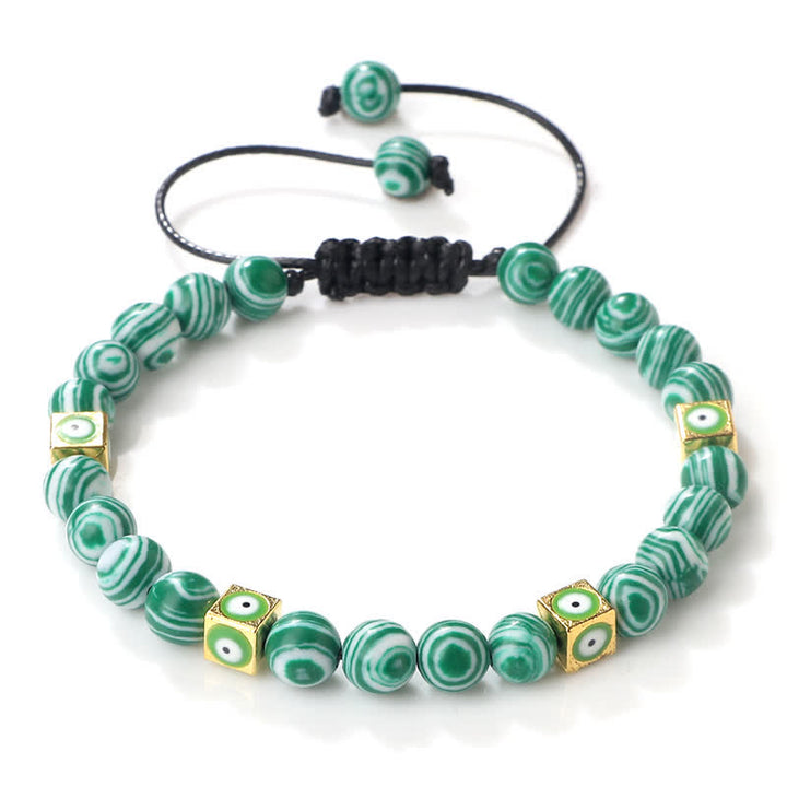 Pulsera trenzada con cuentas de cristal natural de Olivenorma para el mal de ojo 