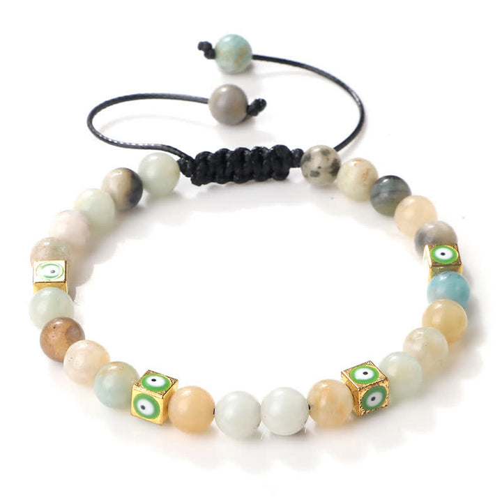 Pulsera trenzada con cuentas de cristal natural de Olivenorma para el mal de ojo 
