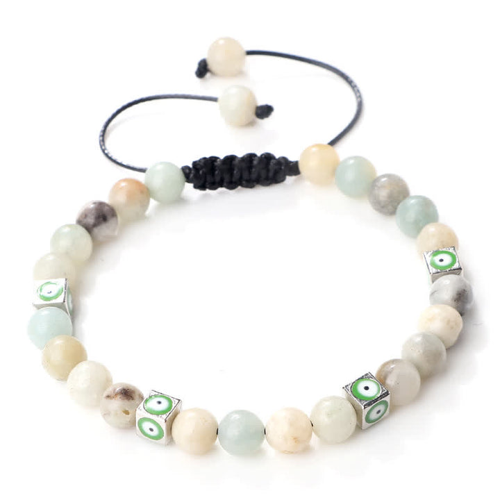 Pulsera trenzada con cuentas de cristal natural de Olivenorma para el mal de ojo 