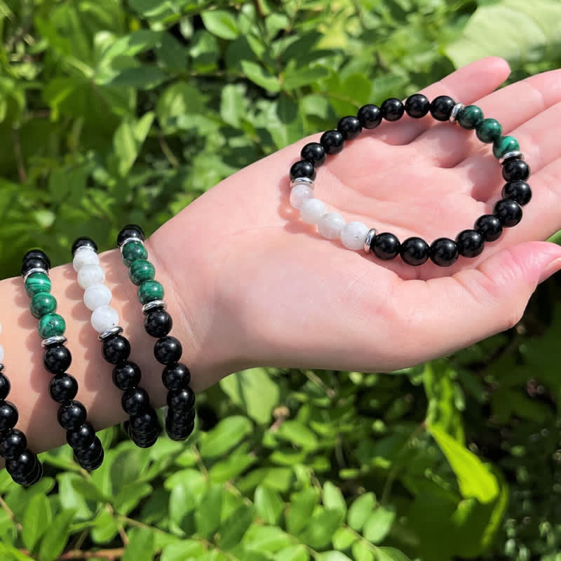Pulsera de cuentas de piedra lunar, malaquita y obsidiana de Olivenorma 