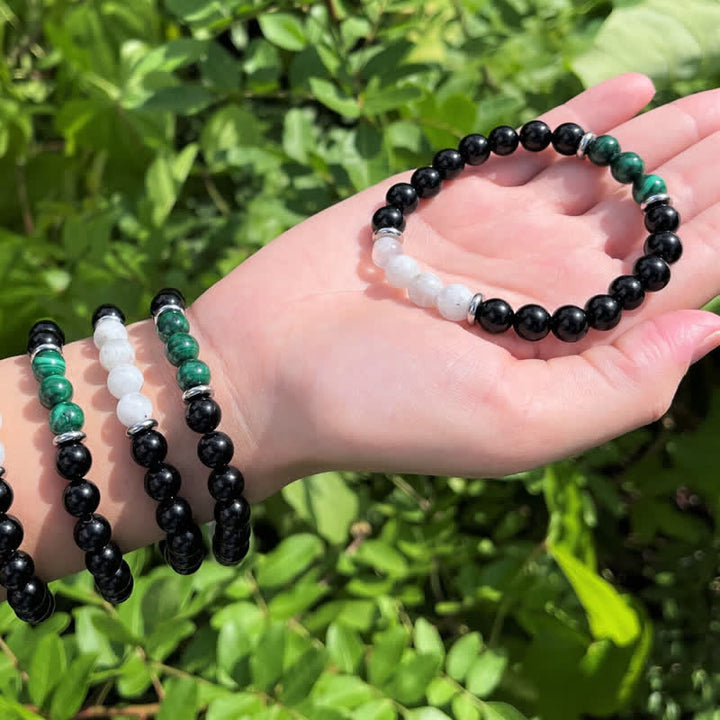 Pulsera de cuentas de piedra lunar, malaquita y obsidiana de Olivenorma 