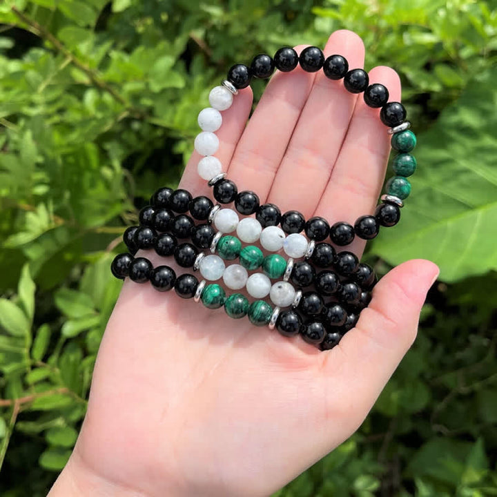 Pulsera de cuentas de piedra lunar, malaquita y obsidiana de Olivenorma 