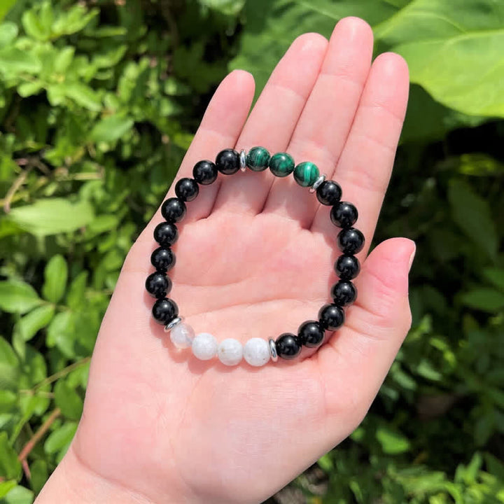 Pulsera de cuentas de piedra lunar, malaquita y obsidiana de Olivenorma 