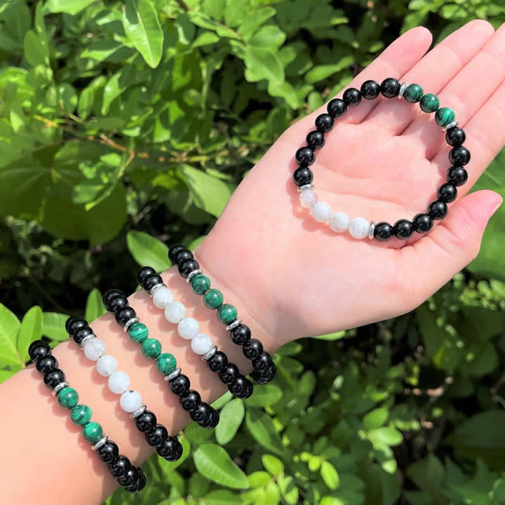 Pulsera de cuentas de piedra lunar, malaquita y obsidiana de Olivenorma 
