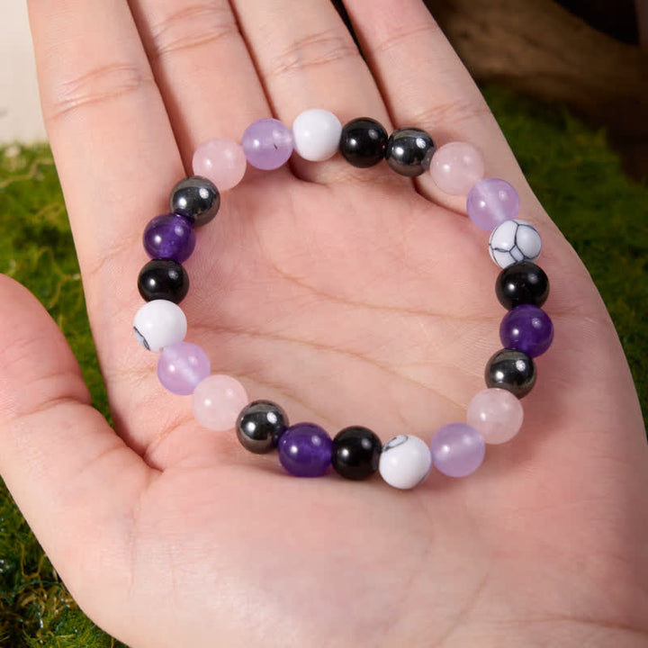 Pulsera de cuentas de hematita, obsidiana, amatista y cuarzo rosa de Olivenorma 