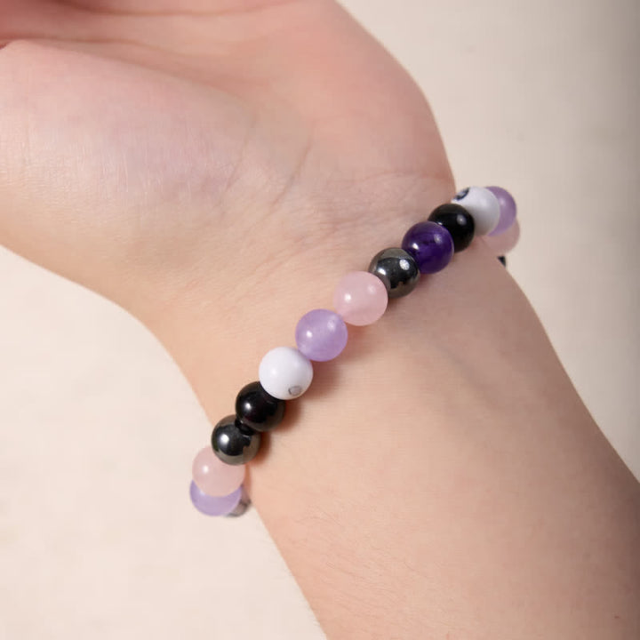 Pulsera de cuentas de hematita, obsidiana, amatista y cuarzo rosa de Olivenorma 