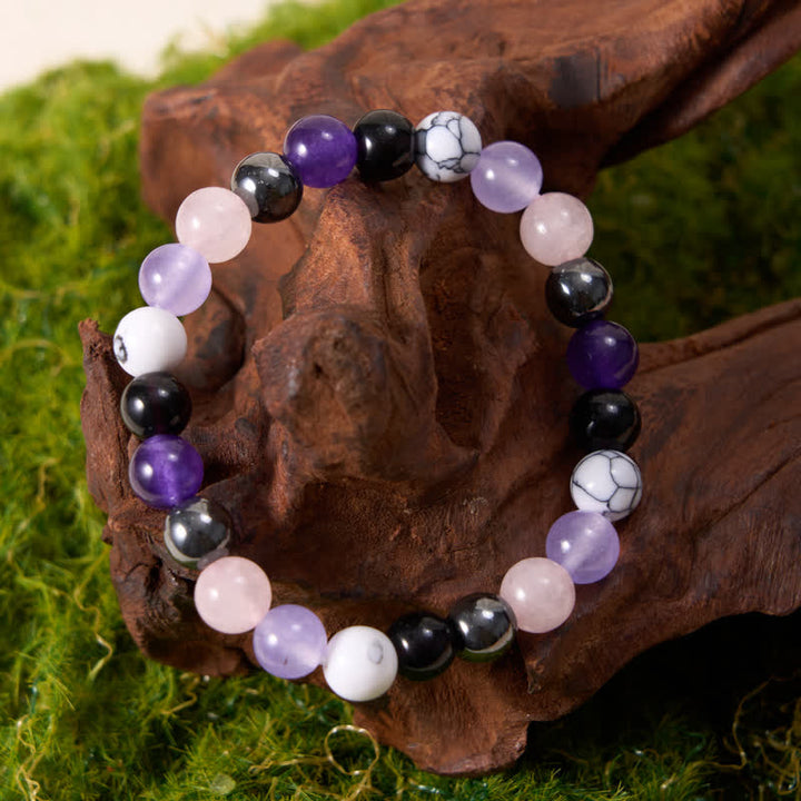 Pulsera de cuentas de hematita, obsidiana, amatista y cuarzo rosa de Olivenorma 